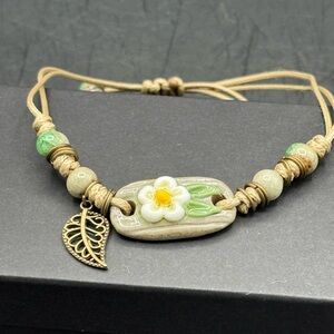 Handmade Adjustable Floral Bracelet with Leaf Pendant